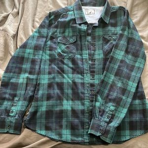Large. Like new blue and green flannel.